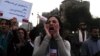 A woman shouts slogans against Egyptian President Mohamed Morsi and members of the Brotherhood during a march against sexual harassment and violence against women in Cairo, Feb. 6, 2013. 