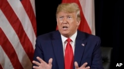 Le président Donald Trump, lors de sa rencontre avec le président polonais Andrzej Duda en marge de l'Assemblée générale des Nations Unies, le 23 septembre 2019, à New York.