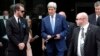 U.S. Secretary of State John Kerry leaves a meeting at a hotel in Vienna, Austria, July 14, 2014.