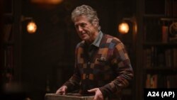 This image released by A24 shows Hugh Grant in a scene from "Heretic." 