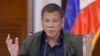 FILE - Philippine President Rodrigo Duterte discusses issues related to the new coronavirus, in Panacan, Davao City, southern Philippines, July 7, 2020