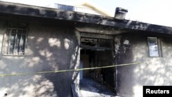 A view of damage at the burned Islamic Society of Coachella Valley, Dec. 12, 2015. 