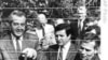 Hungarian Foreign Minister Gyula Horn (r) with Austrian counterpart Alois Mock cut through barbed wire of former Iron Curtain marking border between East, West in Sopron, Hungary, 27 Jun 1989