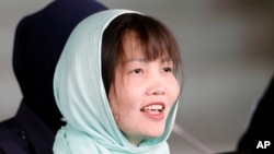 Doan Thi Huong meninggalkan Pengadilan Tinggi Shah Alam, Malaysia, 1 April 2019.