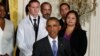 U.S. President Barack Obama (R) speaks about the government's Ebola response from the East Room of the White House in Washington, Oct. 29, 2014.