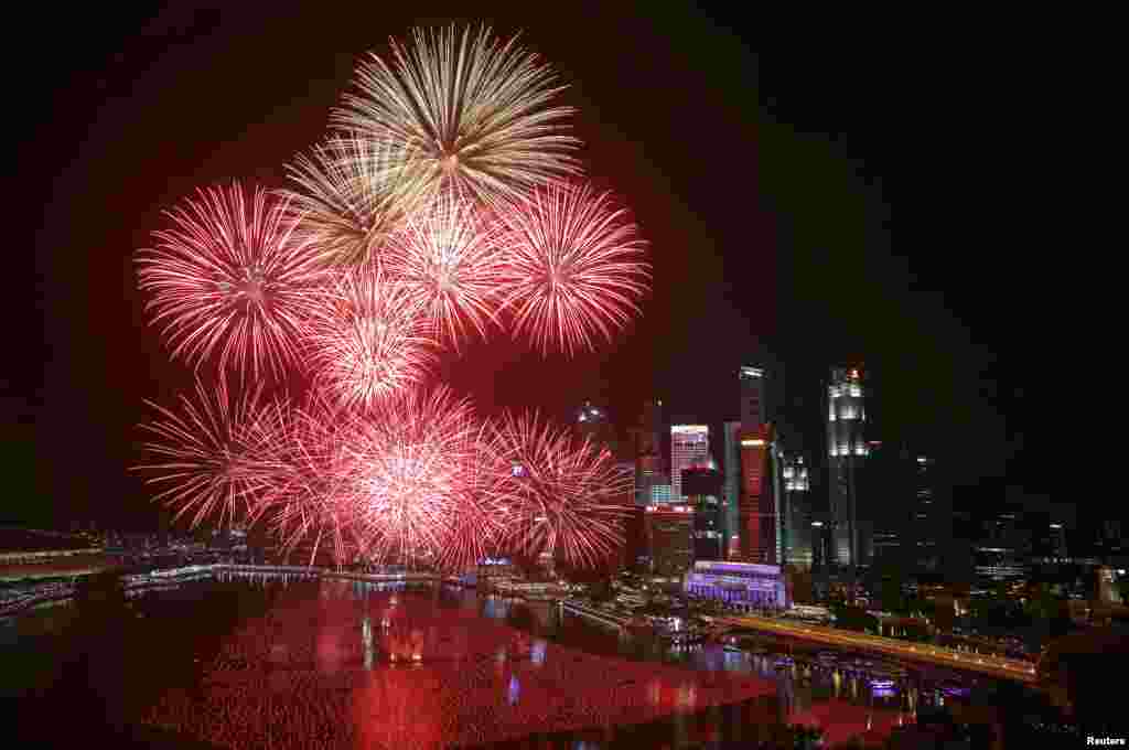 Fireworks explode in Marina Bay against the skyline of Singapore during New Year's Day celebrations, Jan. 1, 2016.