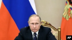 Le président russe Vladimir Poutine au Kremlin, Moscou, Russie, 26 Septembre 2016. (Alexei Nikolsky/Sputnik, Kremlin Pool Photo via AP)