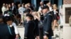 Students from the Infantry Basic Officer Leader Course Class 07-16 celebrate with their families and fellow classmates after graduation, at Fort Benning, Georgia, Oct. 26, 2016.