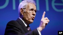 In this Oct. 1, 2018 file photo, moderator Alex Trebek speaks during a gubernatorial debate between Democratic Gov. Tom Wolf and Republican Scott Wagner in Hershey, Pa. 
