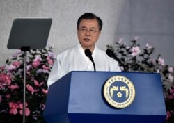 FILE - South Korean President Moon Jae-in speaks during a ceremony to mark the 74th anniversary of Korea's liberation from Japanese colonial rule, at the Independence Hall of Korea in Cheonan, Aug. 15, 2019.