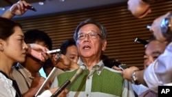FILE - Okinawa Gov. Takeshi Onaga, Aug. 7, 2015. 