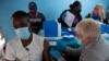 A man gets vaccinated against COVID-19 at a site near Johannesburg, South Africa, Dec. 8, 2021. 