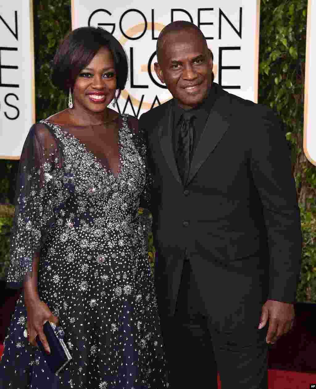 Viola Davis, left, and Julius Tennon arrive at the 73rd annual Golden Globe Awards on Jan. 10, 2016, at the Beverly Hilton Hotel in Beverly Hills, Calif.