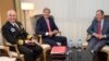 FILE - From left, Vice Admiral Kurt Tidd, U.S. Secretary of State John Kerry and Russia's Foreign Minister Sergei Lavrov sit for a photo opportunity, Nov. 23, 2013, in Geneva, Switzerland, during the Iran nuclear talks. Tidd said Tuesday that the flow of foreign fighters from Latin America to the Middle East has been "significantly curtailed."