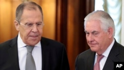 FILE - US Secretary of State Rex Tillerson,right, and Russian Foreign Minister Sergey Lavrov, enter a hall prior to their talks in Moscow, Russia, April 12, 2017.