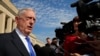 FILE - U.S. Defense Secretary Jim Mattis speaks to reporters at the Pentagon, July 27, 2018. 
