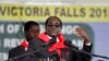 Zimbabwe President Robert Mugabe addresses people gathered for his 91st birthday celebration in Victoria Falls, Feb. 28, 2015. 