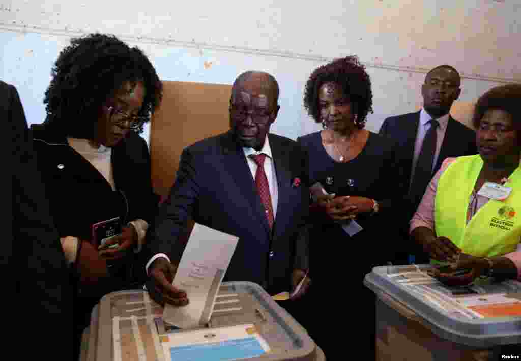 Former President Robert Mugabe casts his ballot in the general elections in Harare, July 30, 2018.
