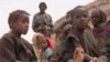 This family from Mali have joined other refugees in Niger. Many are living in makeshift camps along the border, with little food or water.