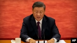 Le président chinois Xi Jinping lors d'un événement pour honorer certains des acteurs impliqués dans la lutte de la Chine contre le COVID-19 au Grand Hall du Peuple à Pékin, le mardi 8 septembre 2020. (Photo AP / Mark Schiefelbein)