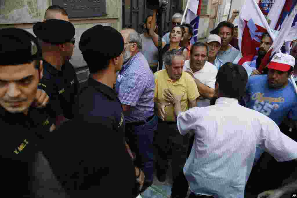 Greece braced for more chaos on the streets outside of shuttered banks as Athens and its creditors halted talks on resolving the country's deepening financial crisis until a referendum this weekend, July 3, 2015.