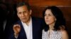 Peru's former President Ollanta Humala speaks next to his wife Nadine Heredia in the door of their home after they were released from prison in Lima, April 30, 2018. 