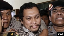 Gayus Tambunan saat menghadiri sidang vonis penjatuhan hukumannya (1/19).