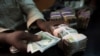 Dan canji rike da dalar Amurka da kuma Naira