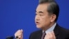 Chinese Foreign Minister Wang Yi attends a news conference on the sidelines of the National People's Congress, China's parliamentary body, in Beijing, March 8, 2019.