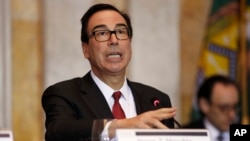 Treasury Secretary Steve Mnuchin speaks during a meeting of the Financial Stability Oversight Council, Oct. 16, 2018, at the Treasury Department, in Washington. 