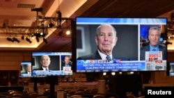 An image of Democratic presidential candidate Michael Bloomberg appears on a video monitor inside the media center for Wednesday's Democratic presidential debate, in Las Vegas, Nevada, Feb. 18, 2020.