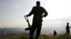 Des soldats se tiennent dans un camp de campagne des FARDC à Paida, près de Beni, dans la province du Nord-Kivu, en République démocratique du Congo, le 7 décembre 2018.