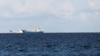 FILE - Chinese vessels are pictured in disputed South China Sea, April 21, 2017.