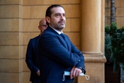 FILE - Then-outgoing Prime Minister Saad Hariri waits to welcome Egyptian Foreign Minister Sameh Shukry before their meeting at his house in downtown Beirut, Lebanon, April 7, 2021. (AP Photo/Hassan Ammar)