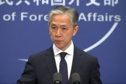 Juru bicara Kemlu China Wang Wenbin berbicara kepada media di Beijing.