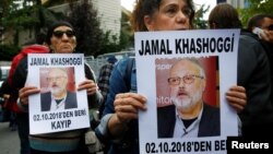 انسانی حقوق کے کارکن استنبول میں سعودی قونصلیٹ کے باہر خشوگی کی تصاویر کے ساتھ احتجاج کر رہے ہیں۔ 9 اکتوبر 2018