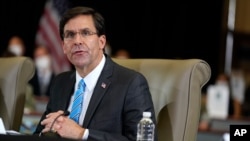 FILE - Defense Secretary Mark Esper, July 10, 2020.