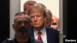 Former U.S. President Donald Trump arrives at Manhattan Criminal Courthouse, after his indictment by a Manhattan grand jury following a probe into hush money paid to Stormy Daniels, in New York City, April 4, 2023.