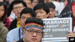 Para pendukung LGBT dan HAM dalam aksi unjuk rasa damai untuk mendukung pernikahan sesama jenis di Taipei, Taiwan, 10 Desember 2016. (Foto: dok).