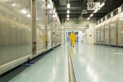 FILE - In this photo taken Nov. 6, 2019, and released by Iran's Atomic Energy Organization shows the interior of the Fordo Uranium Conversion Facility in Qom, in northern Iran.