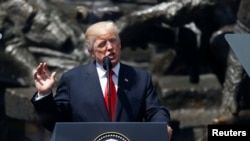 President Donald Trump gives a public speech in front of the Warsaw Uprising Monument at Krasinski Square, in Warsaw, July 6, 2017.