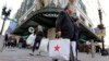 FILE - Shoppers carry bags through the Downtown Crossing of Boston, May 18, 2016. The University of Michigan said Jan. 18, 2019, that its consumer sentiment index had fallen 7.7 percent in early January to a reading of 90.7, the lowest reading since October 2016.