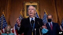 Senate Majority Leader Mitch McMcConnell of Ky., speaks to reporters on Capitol Hill in Washington, Dec. 1, 2020. 
