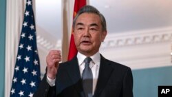 FILE - China's foreign minister Wang Yi before a meeting with U.S. Secretary of State Antony Blinken in Washington, D.C., Oct. 26. 