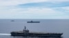 នាវា​ចម្បាំង USS Ronald Reagan (រូប​ខាង​មុខ) និង​នាវា​ចម្បាំង USS Nimitz ធ្វើ​នាវាចរណ៍​រួម​គ្នា​ នៅ​ក្នុង​សមុទ្រ​ចិន​ខាង​ត្បូង កាលពី​ថ្ងៃទី៦ ខែកក្កដា ឆ្នាំ២០២០។