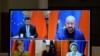 European Commission President Ursula von der Leyen, European Council President Charles Michel, German Chancellor Angela Merkel, French President Emmanuel Macron and Chinese President Xi Jinping hold a video conference, Dec. 30, 2020.