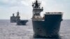 FILE - In this undated photo provided by the Australian Defense Force, Royal Australian Navy Ships Canberra, Supply and Warramunga sail in formation with 37 ships during Exercise Rim of the Pacific 2022.