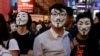 Hong Kong Protesters Challenge New Face Mask Ban in Halloween Rally