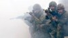 Des soldats britanniques lors de l'exercice de la Force de réaction de l'OTAN à Oksbol, dans l'ouest du Jutland, au Danemark, le 16 mai 2007.