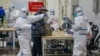 China Struggles to Cope with Surging Numbers of Infected Coronavirus Patients